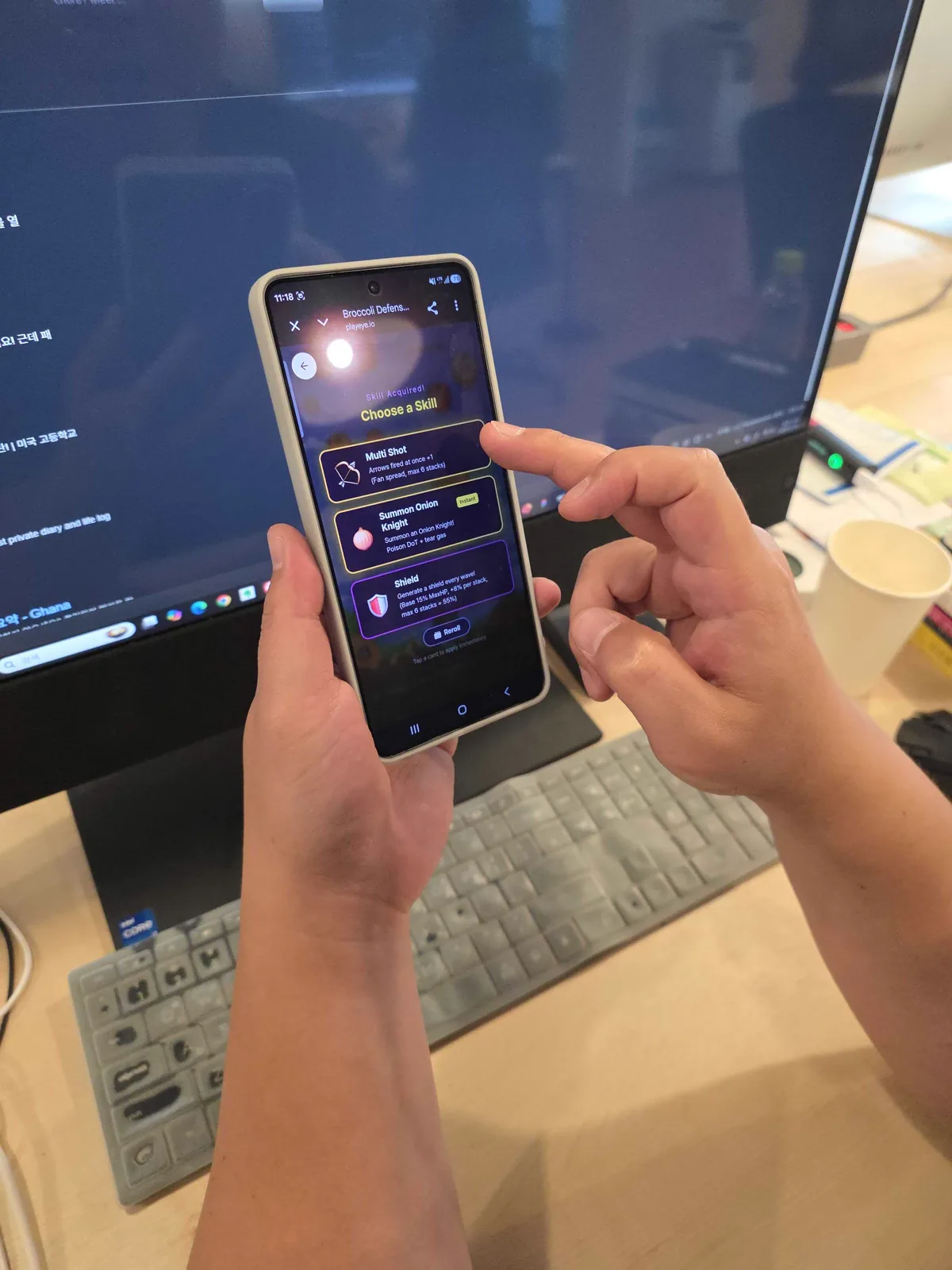A player choosing between Multi Shot, Summon Onion Knight, and Shield in Broccoli Defense on an Android phone